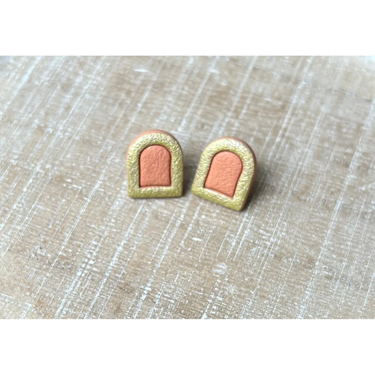 Orange and Gold Arch Framed Studs - Timber and Clay